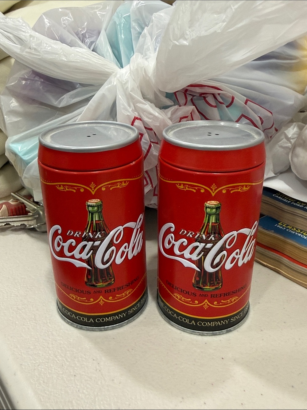 Coca-Cola Red Tin Can Collectible Pair
